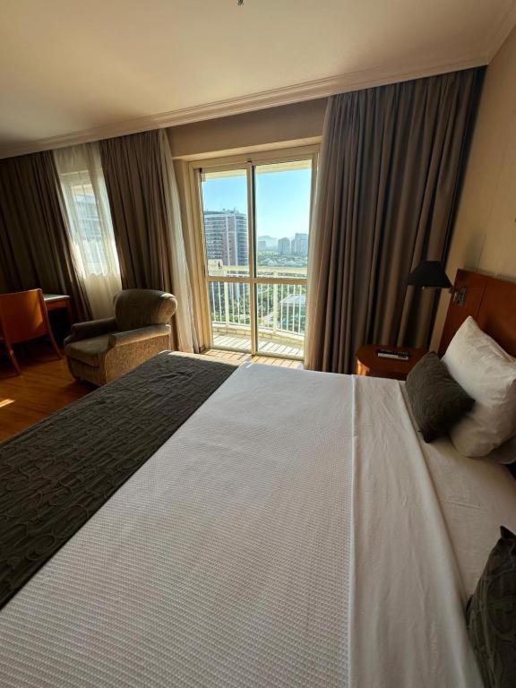 Flat Com Vista Panoramica -15- Na Barra Da Tijuca - Estacionamento Gratuito - Frigobar - Ar Condicionado - Piscina - Academia - Balsa Para Praia Gratis - Varanda - Vista Parcial Mar E Lagoa Rio de Janeiro Extérieur photo